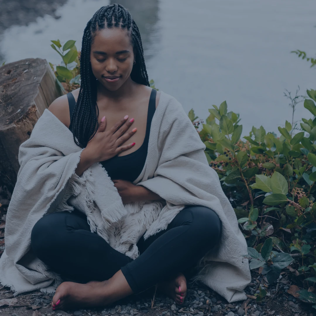 Woman taking a moment to breath and practice mindfulness