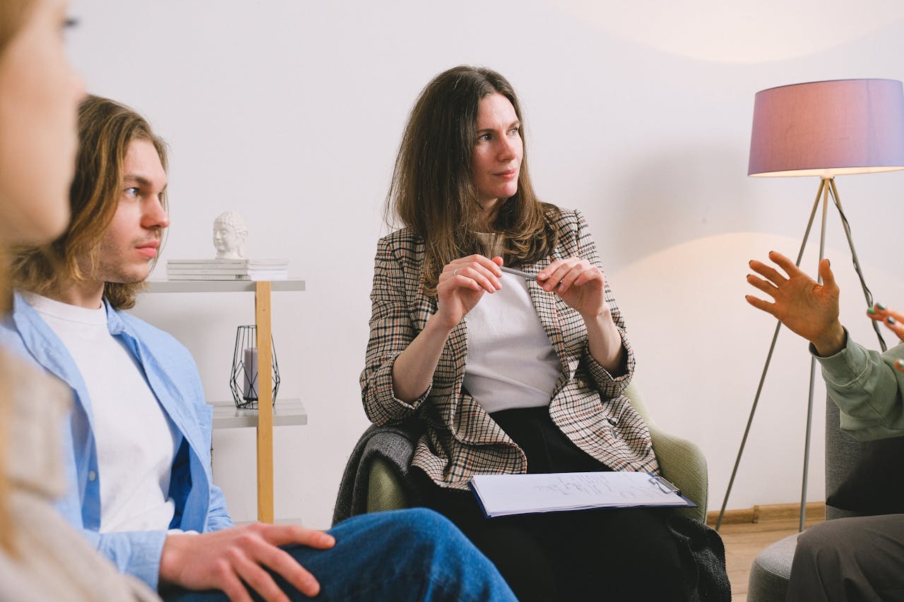 People having a discussion in a support group.